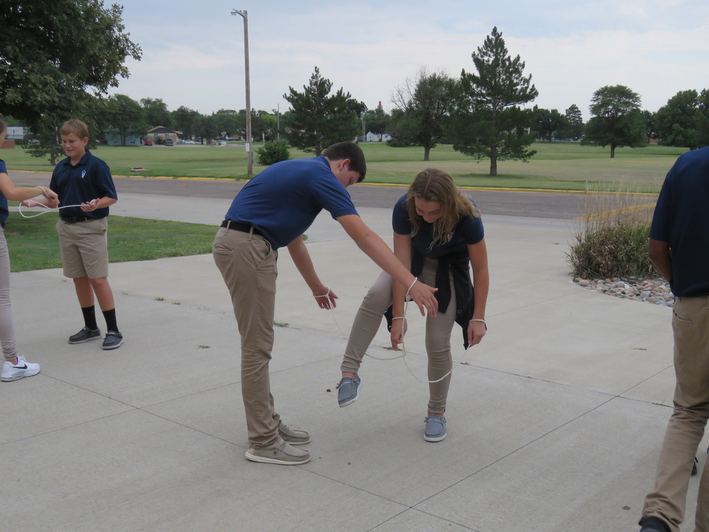 Students get creative to try and solve the Infinity Rope Challenge.  