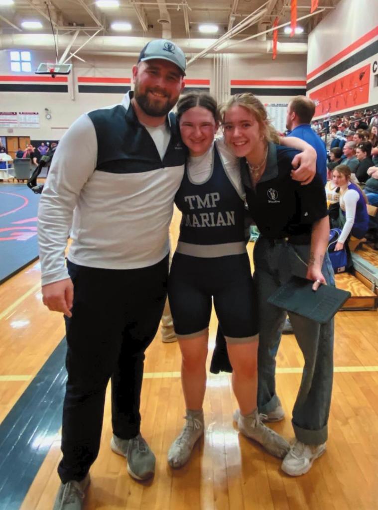 Stein with her coaches