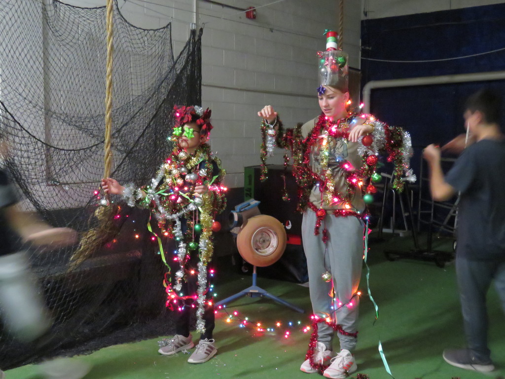 Teams decorated their team leaders as Christmas trees.