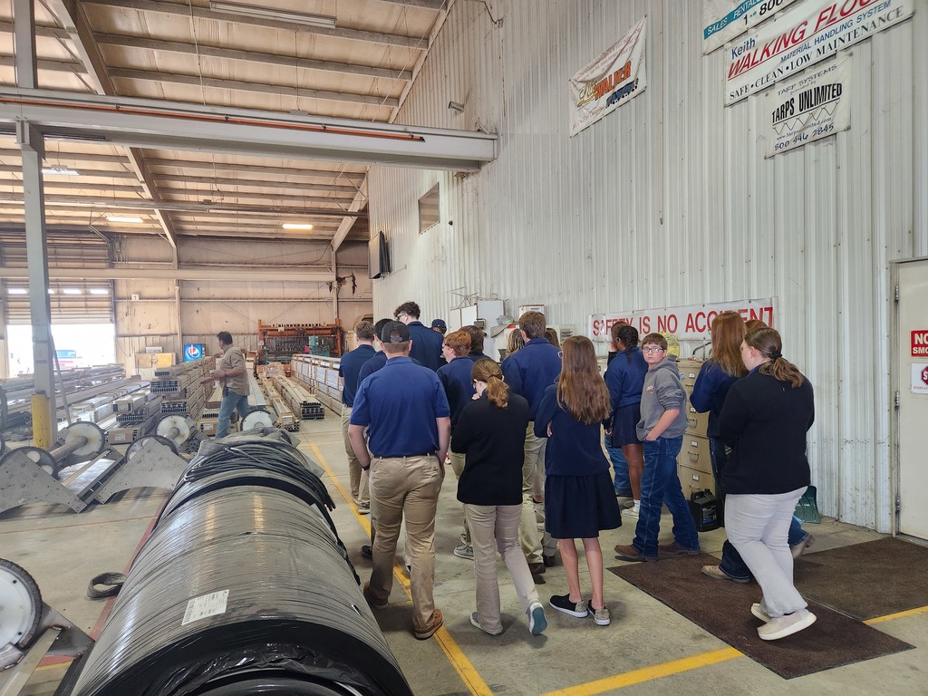 Students touring the Wilkens trailer plant