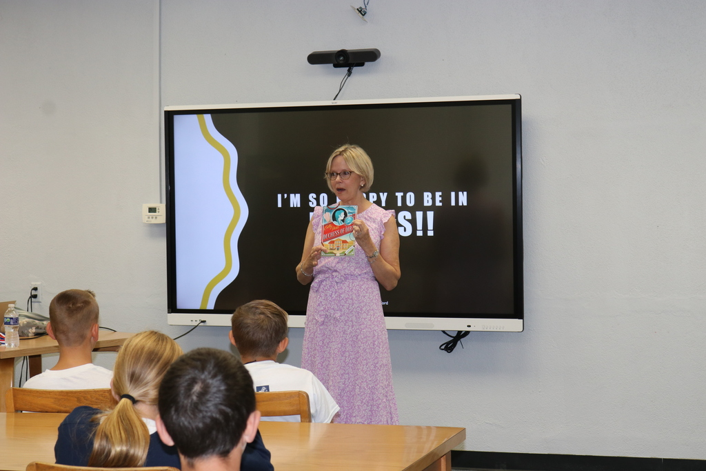 Wilford introduces her novel to the students.